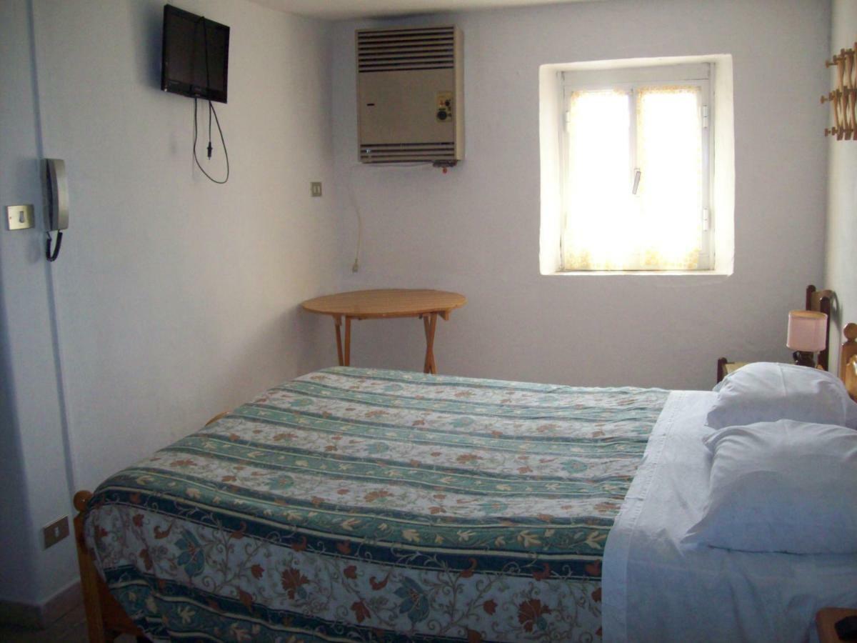 Albergo Casa Del Romano Fascia Bagian luar foto